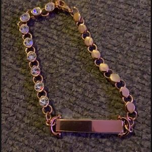 Rose gold toned bracelet.